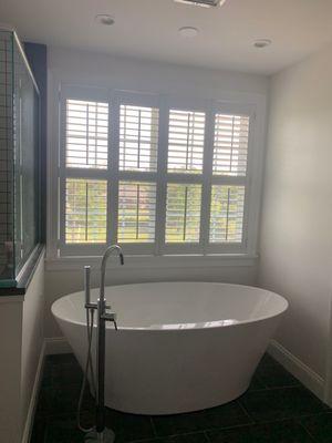 Wooden bathroom shutters