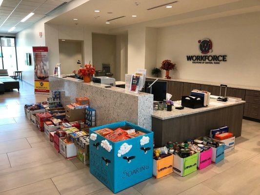 Our Reception Area w/ tons of food from our Food Drive supporting the local Salvation Army