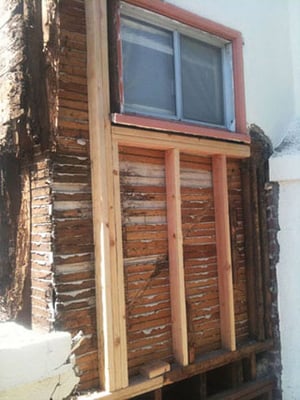 An entire porch rebuilt under the stucco