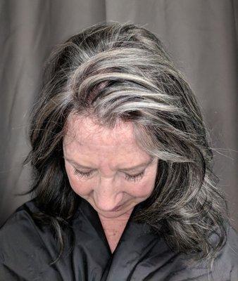 Client came in with brown hair and warm toned highlights/ wanted her hair changed..... now it's .....  Velvet Black and Silver lights!