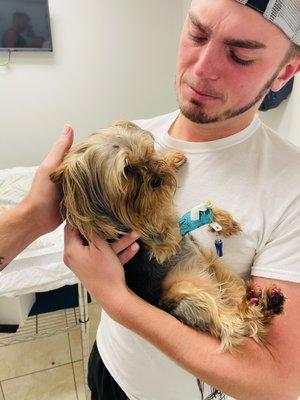 My husband holding Bentley