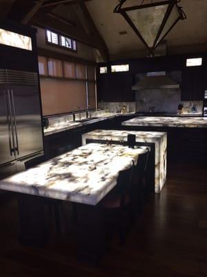 Backlit quartz counter tops.