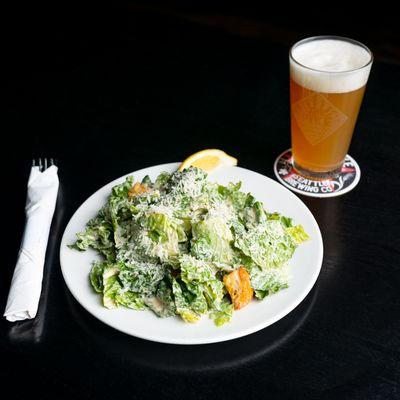 Caesar salad paired with a Pike Cosmic Pulp Ipa