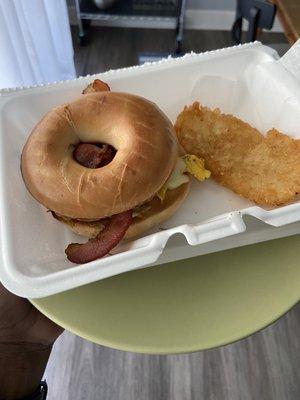 Bacon, egg, and cheese bagel with hash brown combo.