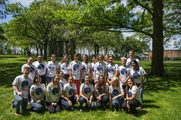 Cancer Research Institute staff wear white for a future immune to cancer in June 2019.