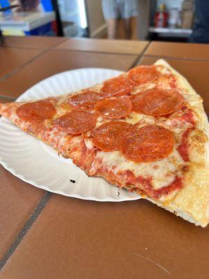 Pepperoni pizza slice