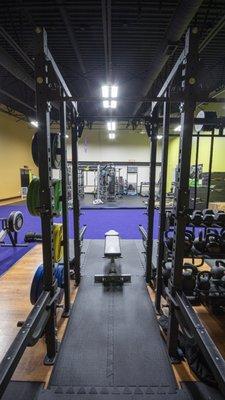 Huge functional training area complete with 5 full racks and platforms, turf and all accessories!