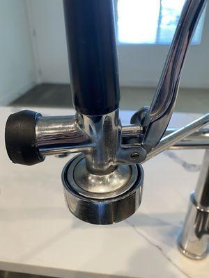 "Move out clean" grime and dirt on the faucet after being "cleaned" in a vacant unit