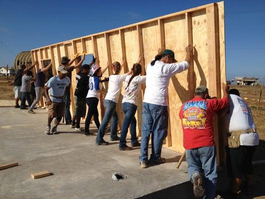 Twin Oaks missions team building a house for a needy family in Mexico.