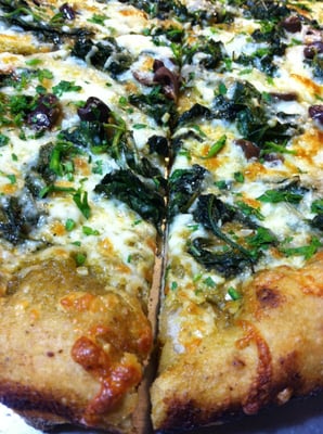 Seasons pizza with kale