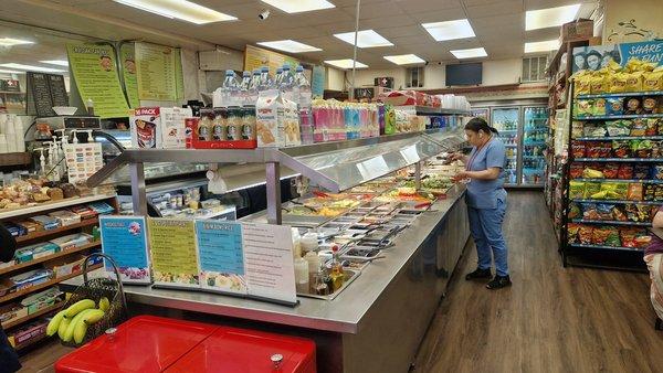 The salad/warm bar is the central feature of this deli