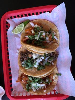 Al pastor, carne asada, and pollo tacos