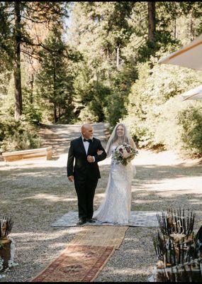 My handsome father walking me down Evergreen Garden.