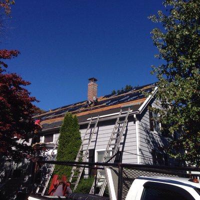 Re-shingling a roof in Reading Massachusetts