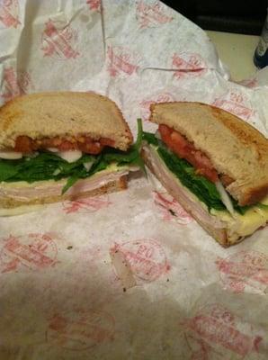 One of my favs- turkey & white american on toasted rye w/ spinach, onions, tomato, mayo, oil, vinegar and oregano