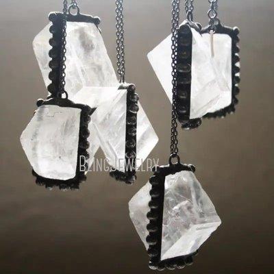 Calcite crystal pendants