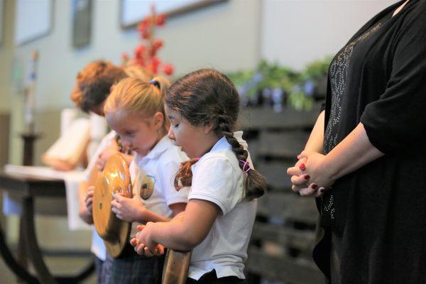 Student led blessings in chapel.