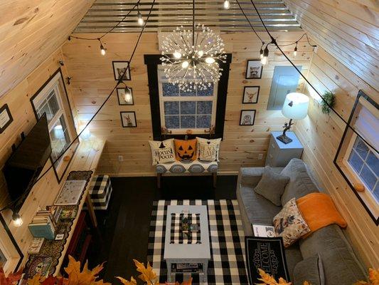 Comfy Living Area Looking Down from Loft Above in Critter Cottage