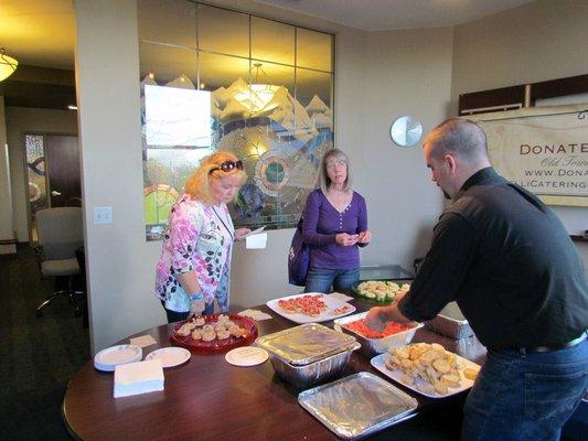 Serving food at a local wine tasting in Parker Colorado