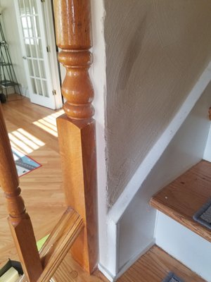 Paint on the floor, wood railing, and definetly not taped off at all.