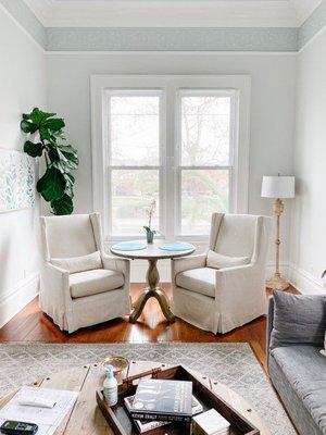 Cozy living room with TV and fireplace.