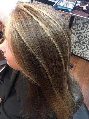 Very natural, sun kissed highlights on this beauty!