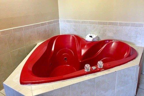 This is a dump! Why is this a heart shaped bath????