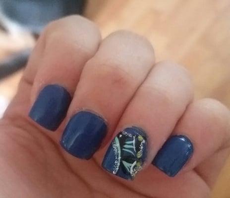 Uneven nail, messy paint and the design is a "wing of a butterfly"