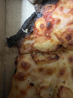 Burt, dried out pizza from Dominos Pizza on 36th and Sheridan, Tulsa, Oklahoma.