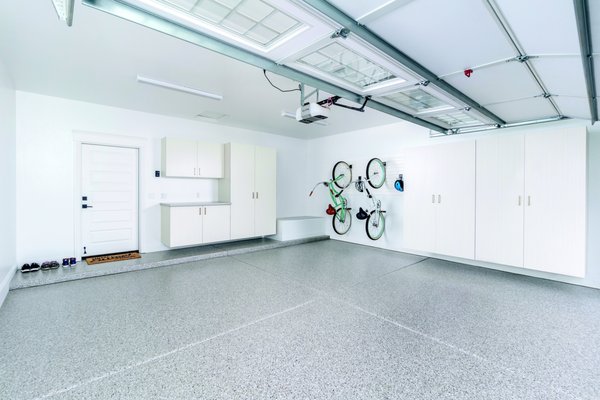 Garage flooring, cabinetry, and bike storage