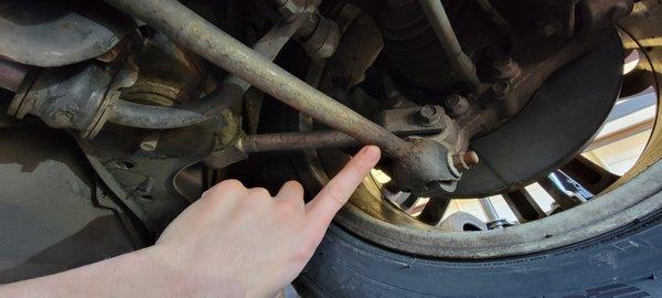 bent rear suspension control arm (also wrong part on right side vs left) doesn't allow for proper alignment unless replaced