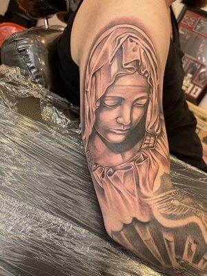 Virgin Mary tattoo