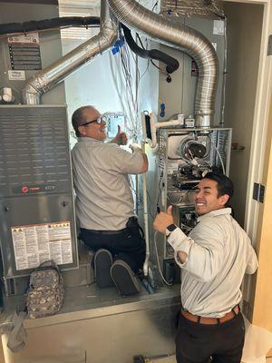 Team work makes the AC work! Mike and Emilio worked together to provide comfort to this customer's home.