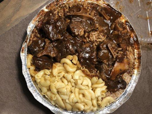 Oxtails, Mac-n-cheese, and rice and beans