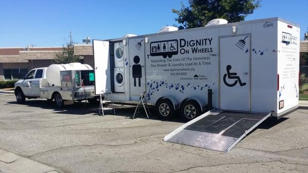 Decals by Daneen placed on the Dignity On Wheels mobile shower and laundry trailer for the homeless. We love it!