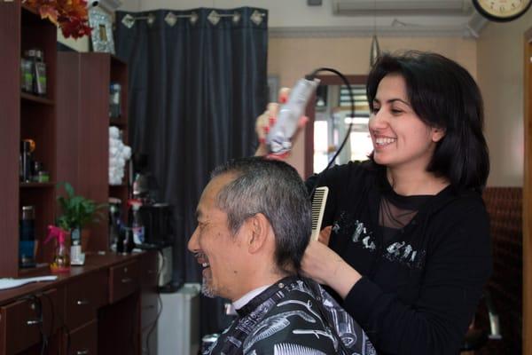 Stylist Liana working her magic at Mr. Right Barbershop.