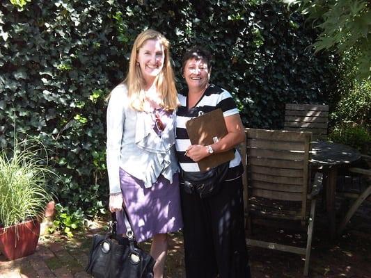 Valerie with client in the garden of one of the homes visited