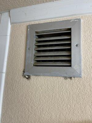 Black mold near the bathroom vent