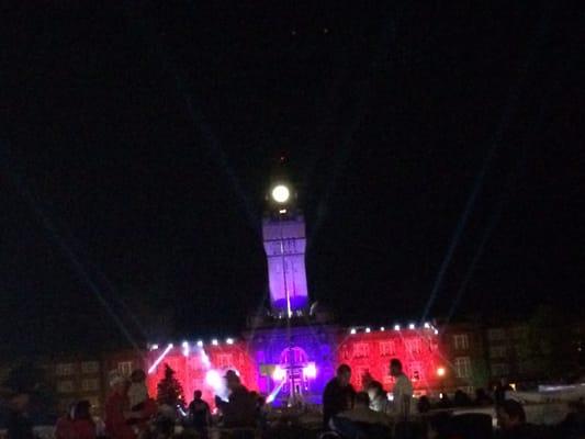 Lighted clock tower before the fireworks