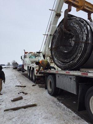 A 50,000lb steel coil that broke chains and fell of a semi