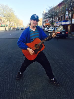 Me playing my guitar on Flatbush ave.