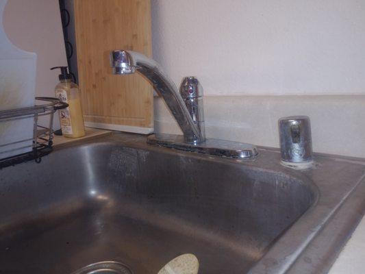 Here is a picture of the faucet they replaced with no spray handle very dirty work