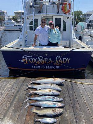 Customers with catch of the day