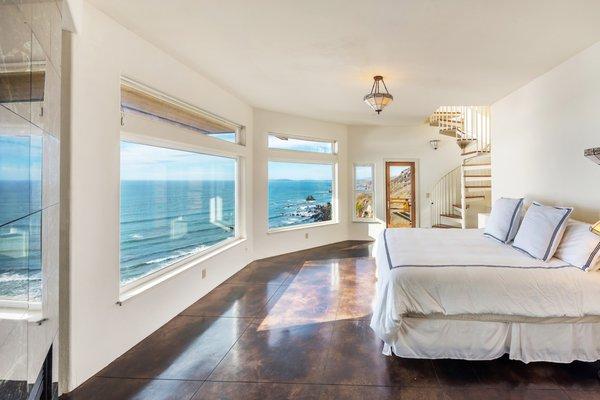 65 Kailua Way. Master bedroom, stairs leading to master bath, overlooking ocean and Dillon Beach.