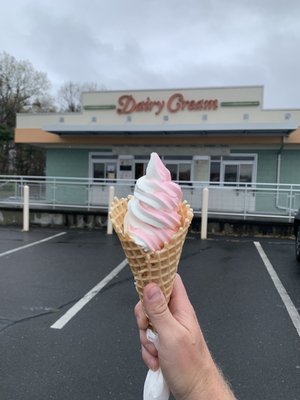 Strawberry/vanilla soft serve in a waffle cone that was still warm