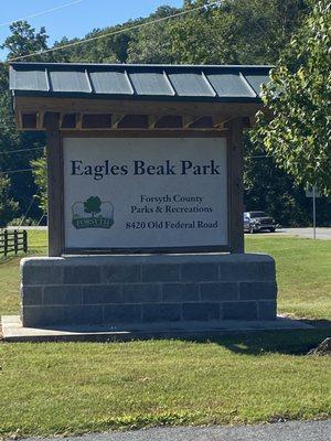 Entrance sign with address.