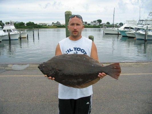 Kenny with an 11+ lb fluke