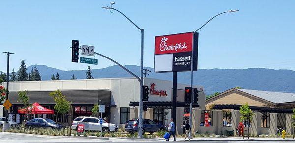 It's open!  It has a drive-thru and a play area.