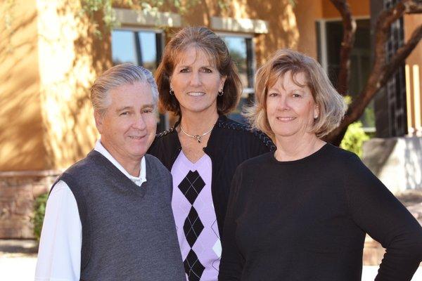 Ron Brown, Sharon Madison, and Debbie Brown, owners of East Mesa Realtor in Arizona