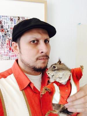 Guy Edwards and Walnut, the office Squirrel, at Brainjar Media